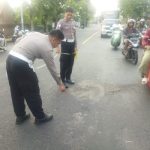 Ket poto: Pilisi melakukan olah TKP di lokasi kejadian